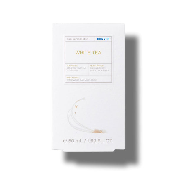 A white rectangular box of KORRES White Tea Eau De Toilette, featuring gold and blue text on a clean white background with a soft shadow.