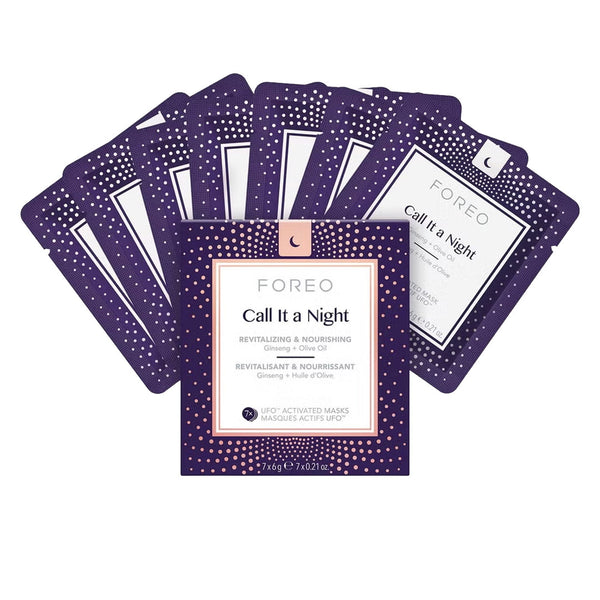 A set of FOREO Call It a Night activated facial masks fanned out behind the outer packaging on a clean white background.