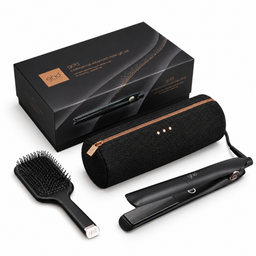ghd Gold Professional Curling Iron set with a black hairbrush, black travel case, and black retail box on a white background.