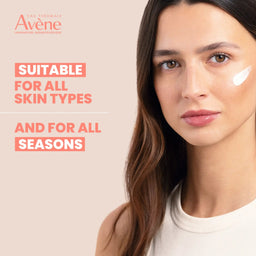 Woman applying cream to her face with Avene branding and text about skin suitability.