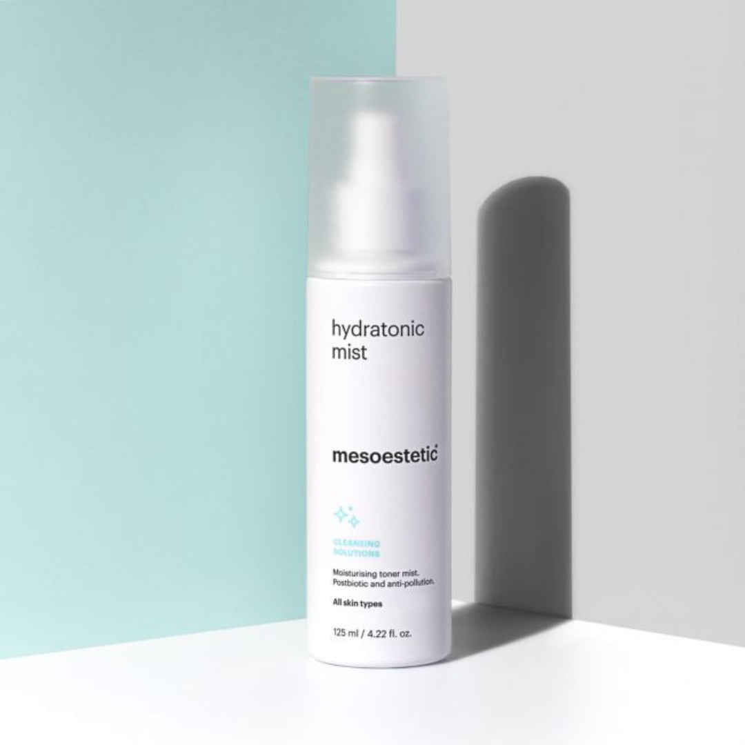 mesoestetic Hydratonic Mist container on a green and white wall