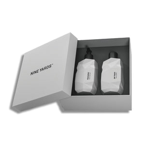 Nine Yards Repair Duo bottles in a grey box